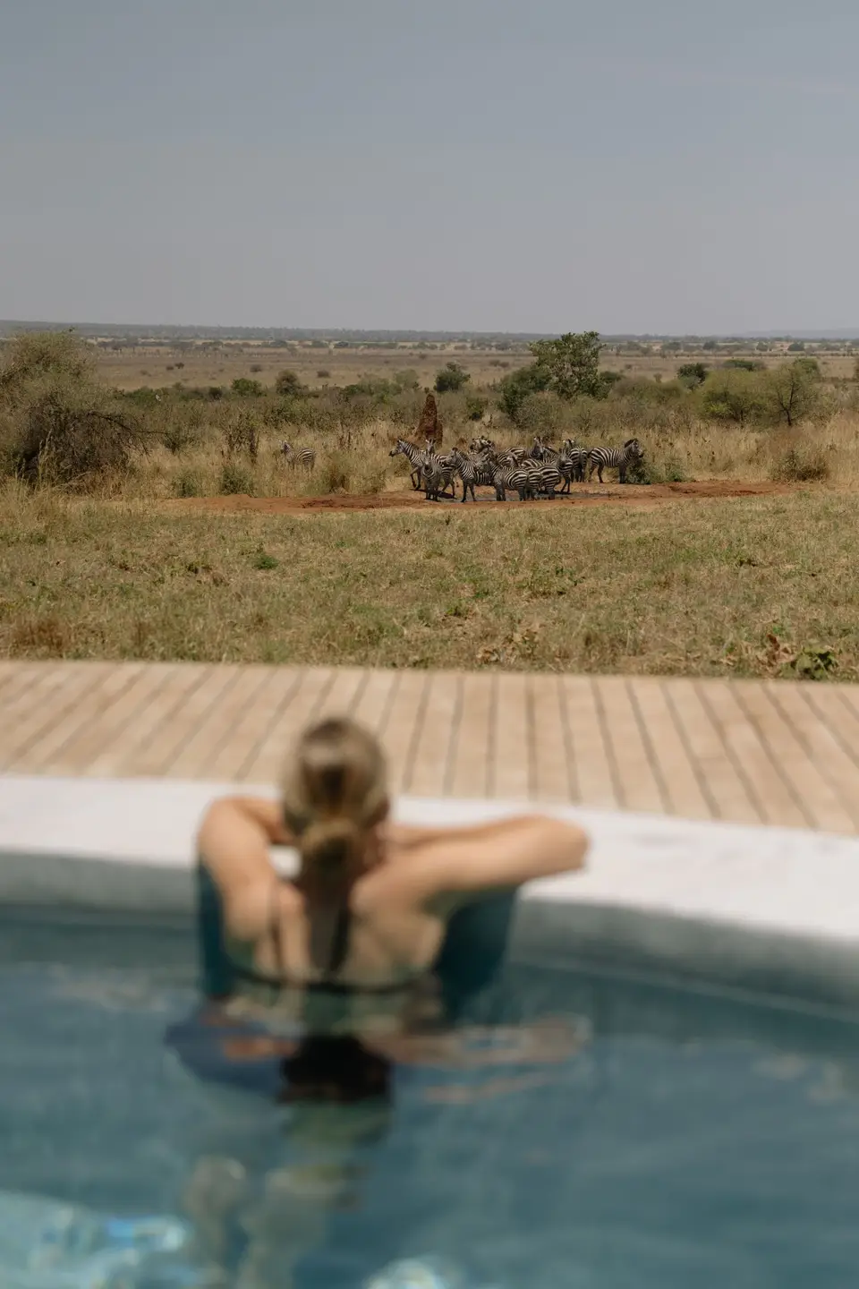 Relaxing by the pool at Randilen Plains Lodge